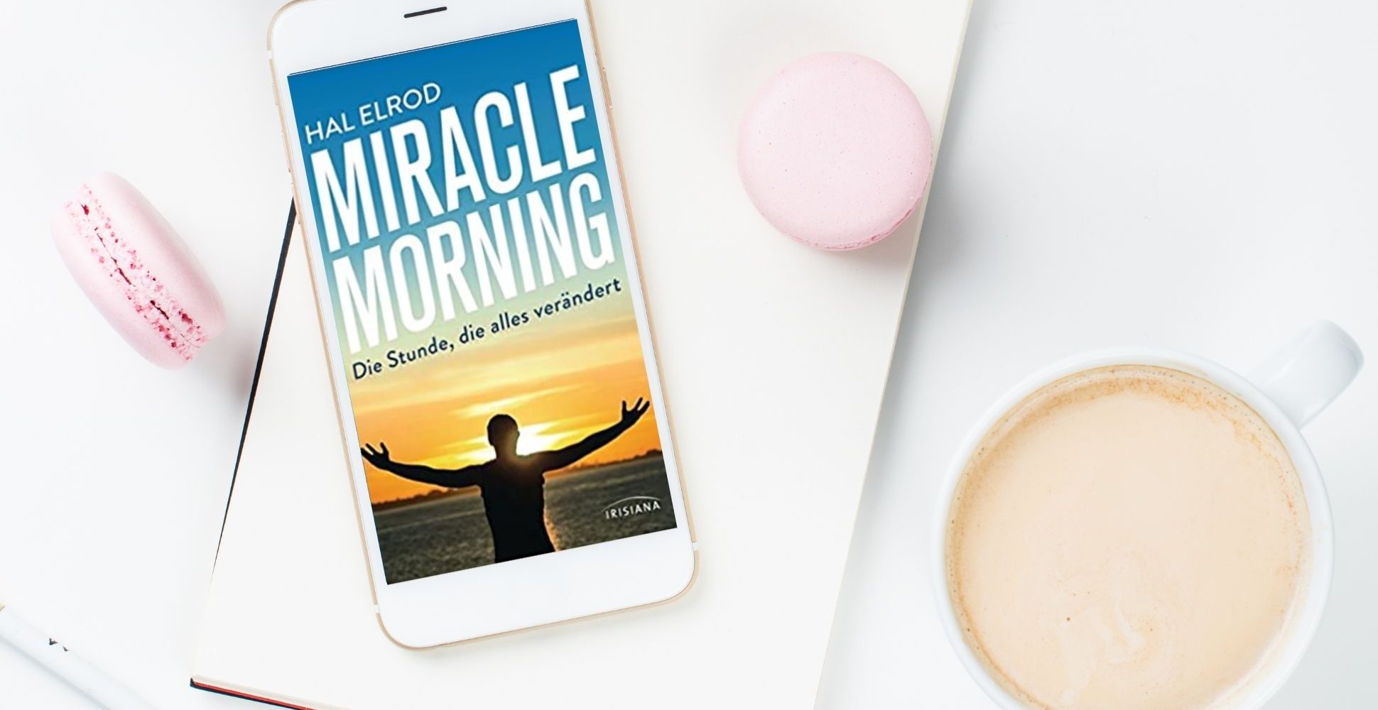 Ein Bild von einem Handy, dass das Cover von Hal Elrods Buch Miracle Morning zeigt. Es deutet auf unsere kompakte Zusammenfassung hin.